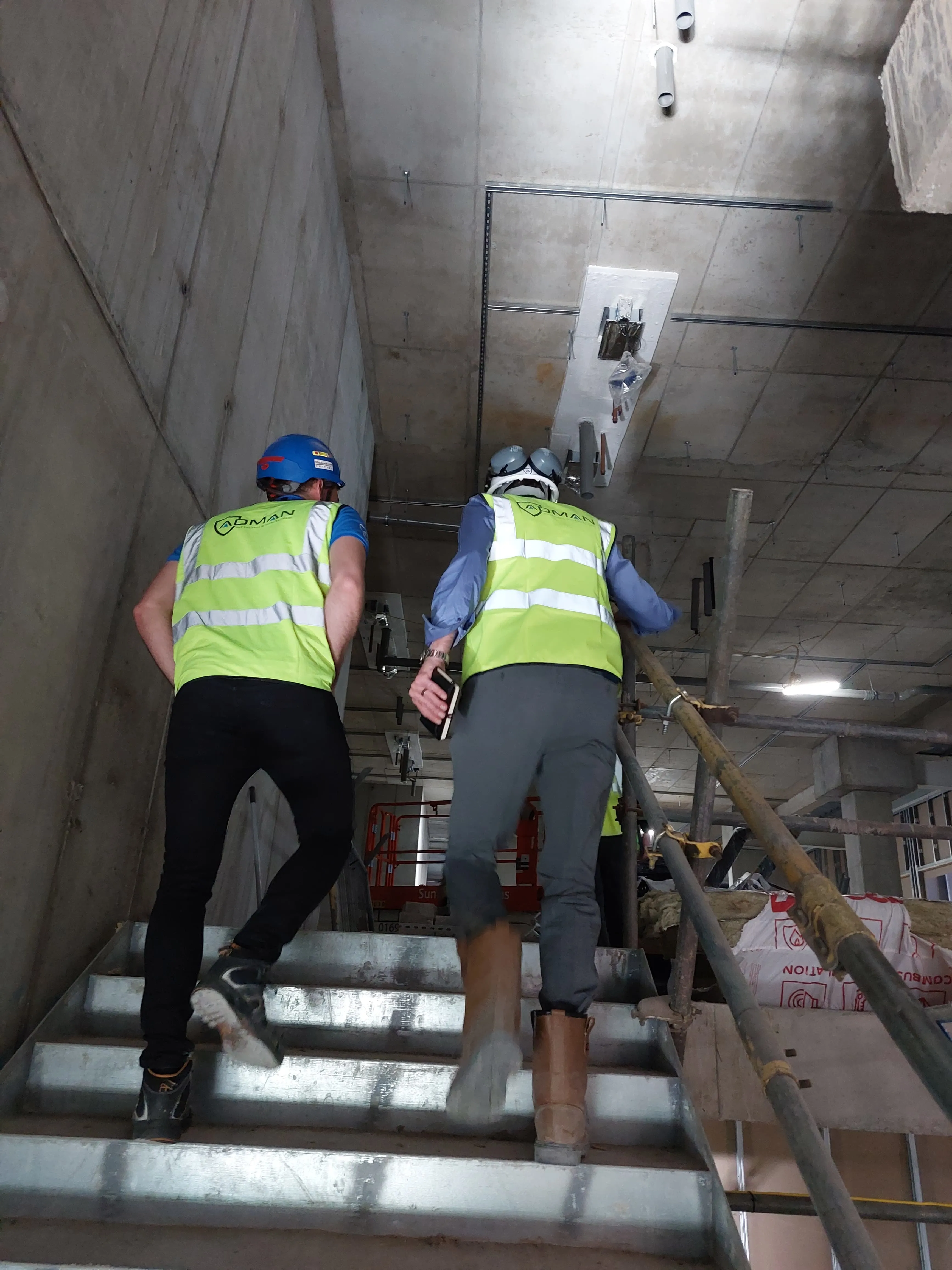 Staff walking up stairs